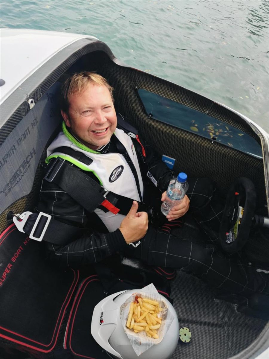 Anthony "Ants" Robertson giving a thumbs up from the cockpit of the F1 Super Boat
